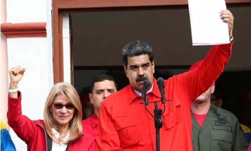 Tổng thống Venezuela - Nicolas Maduro và vợ. Ảnh: Reuters